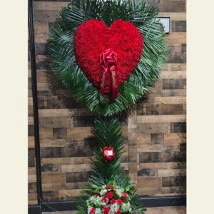 H0550: Red Carnation Heart With Palm Leaf