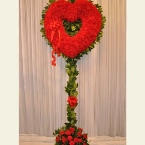 H0750: Open red carnation heart with lemon leaf